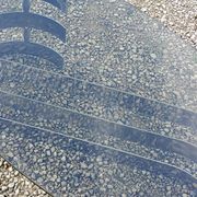 Oval coffee table of the 70s chromed metal base in s smoked glass top
