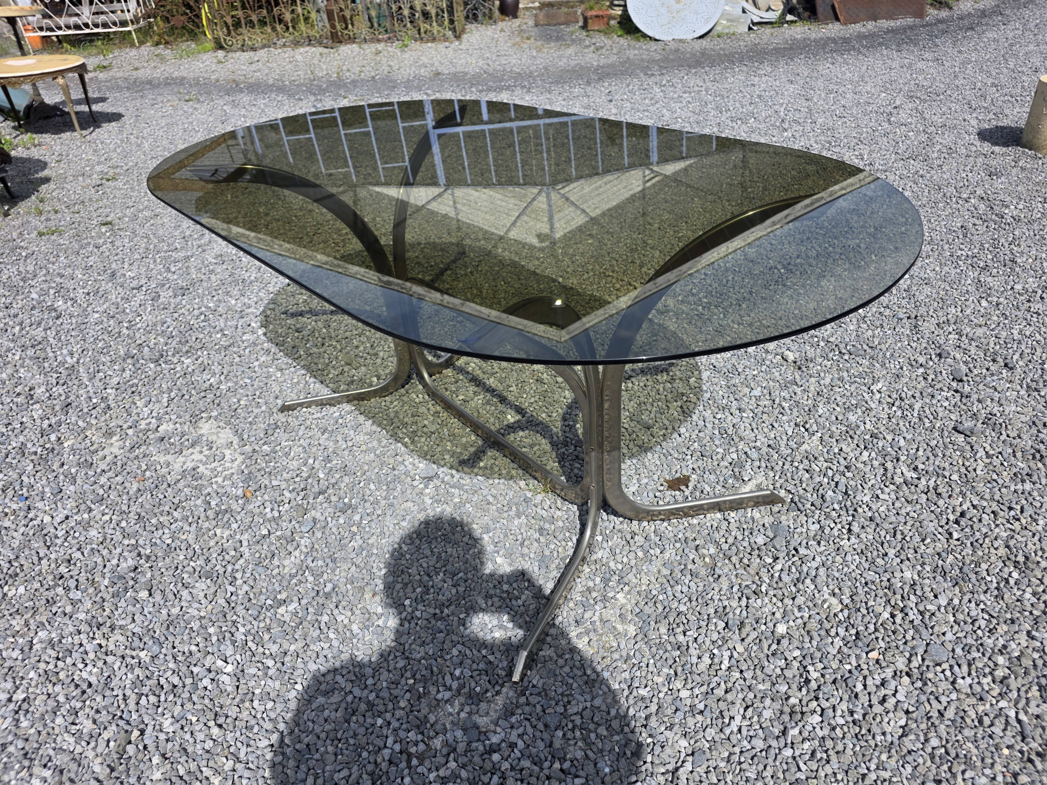 Silver metal table with smoked glass top from the 1970s.