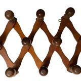 Ancien porte manteau accordéon en bois.