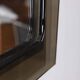 Vintage 1970s wall mirror in smoked glass, Italian design