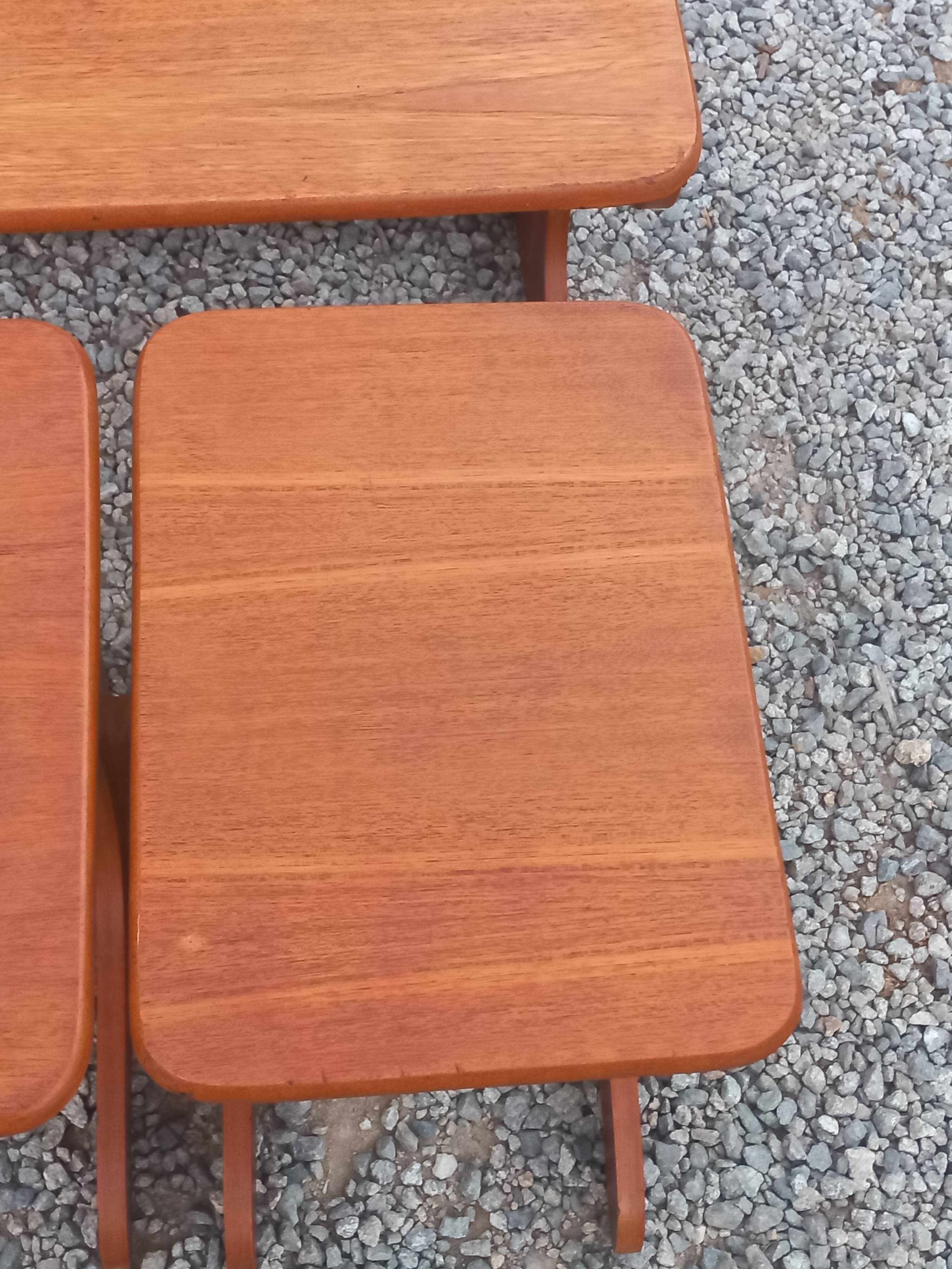 Set of 3 nesting tables in Scandinavian style made of teak from the 1970s.