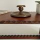 Low brutalist stool in the style of Charles Dudouyt.