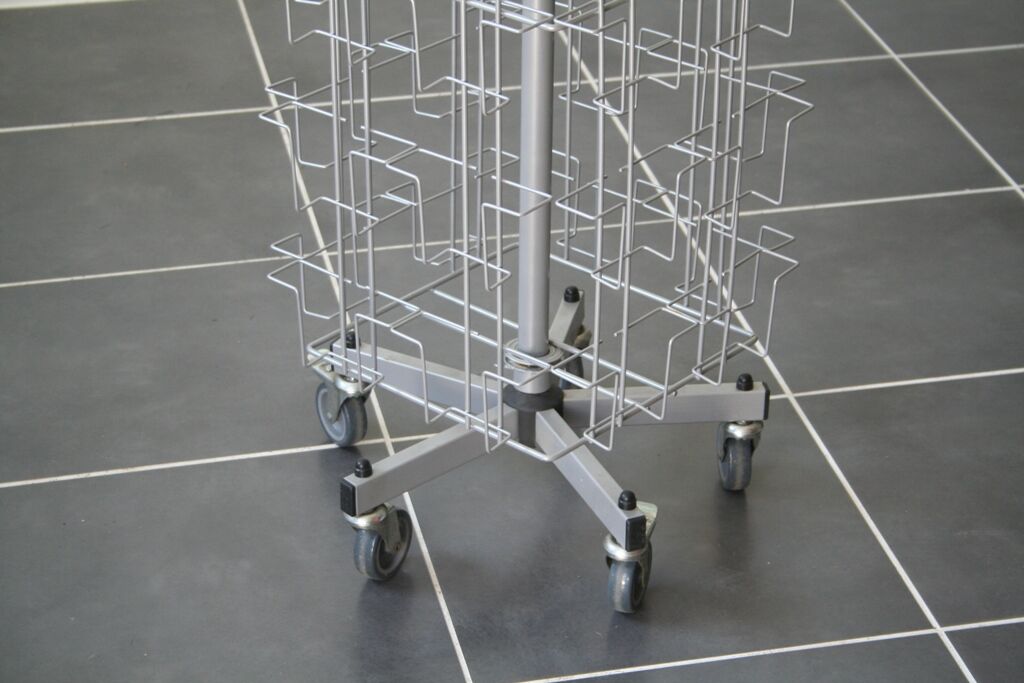 Grey swivel postcard display on wheels