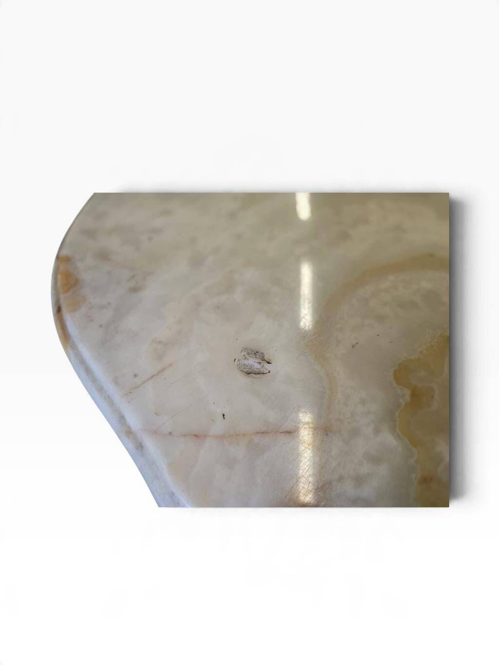 Vintage brass coffee table with onyx top.