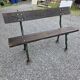 Cast iron garden bench with solid oak seat