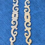 Pair of brass keyholes