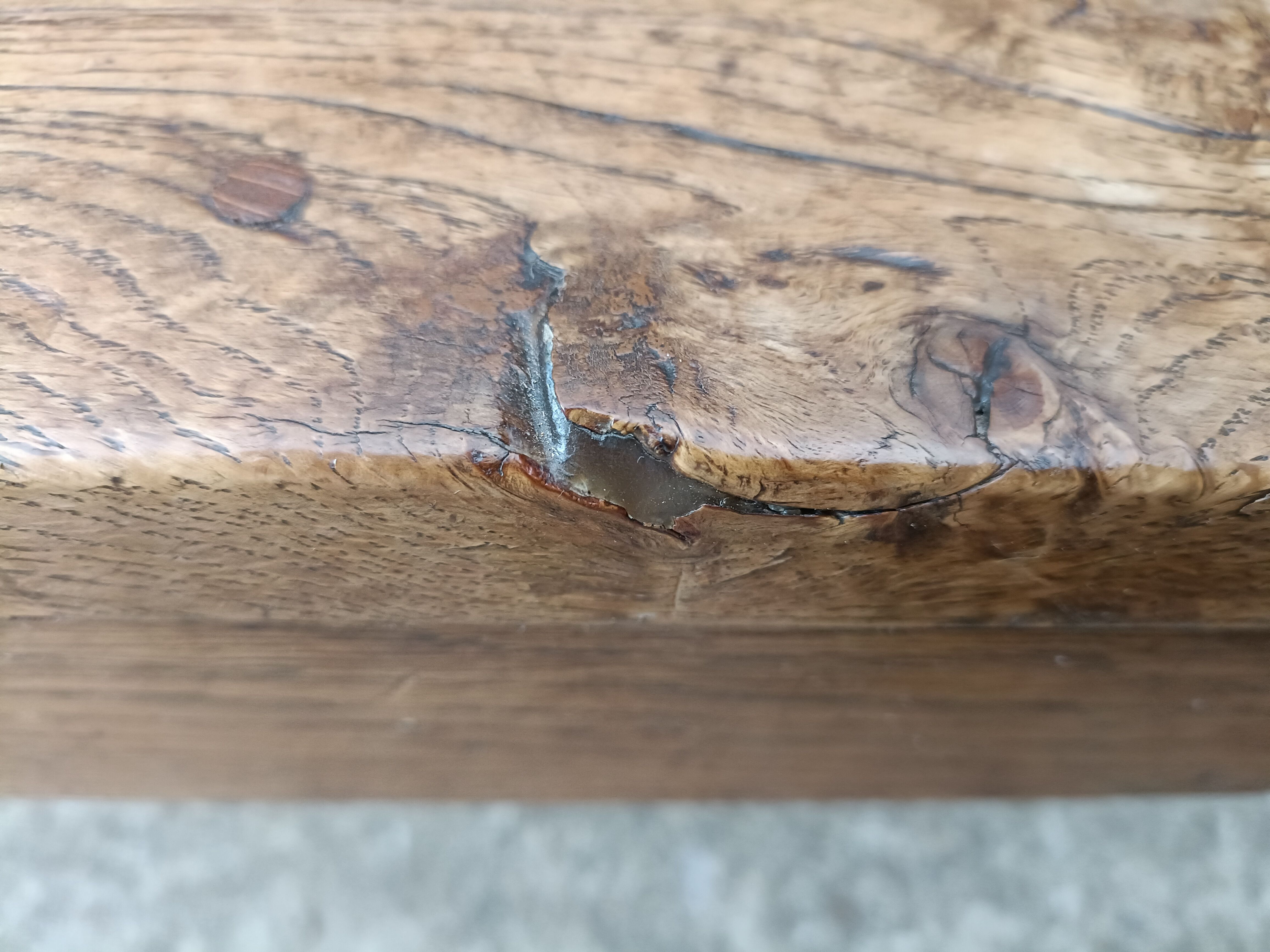 Oak church bench period XVII th century, back decorated with carved parchments