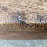 Oak church bench period XVII th century, back decorated with carved parchments