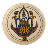 Decorative painted terracotta plate in oriental style