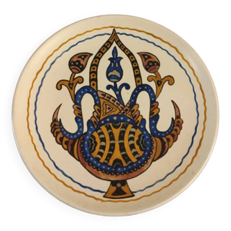 Decorative painted terracotta plate in oriental style