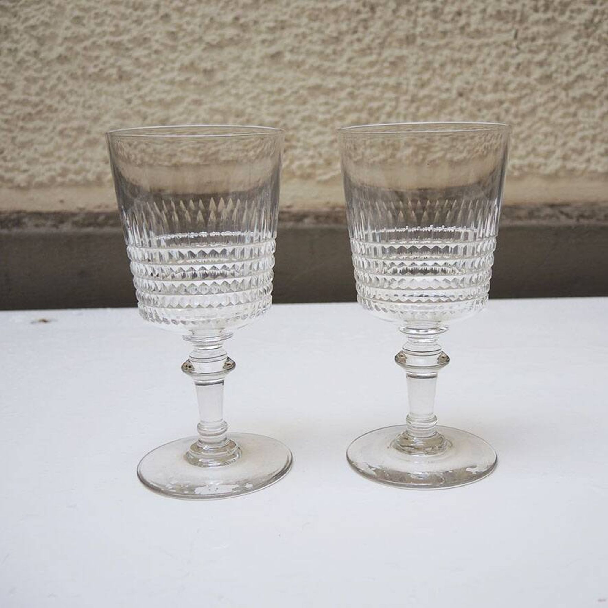 2 antique cut crystal goblets in the Baccarat style.