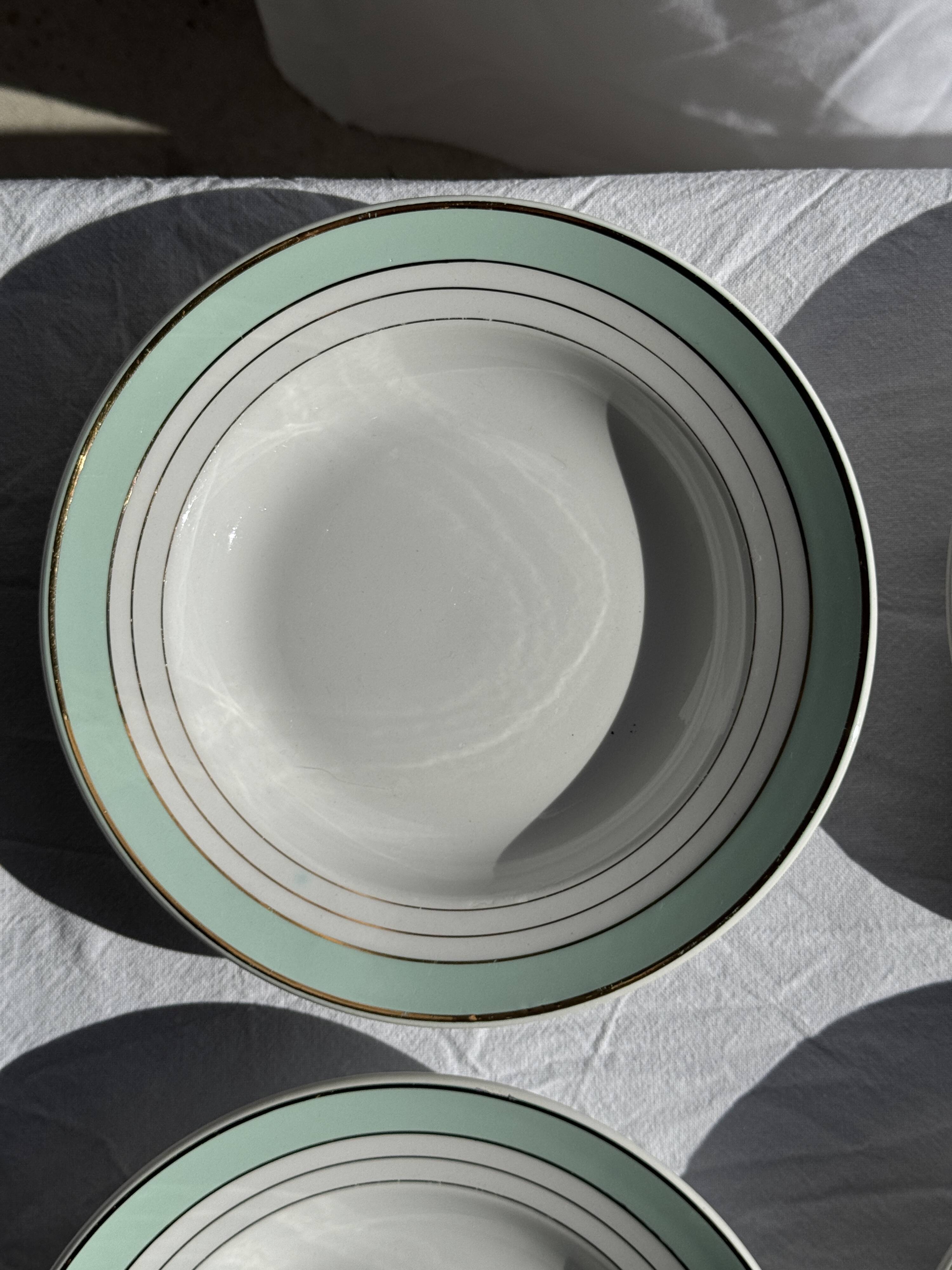 Set of 8 antique turquoise deep plates with a gold rim D22.5