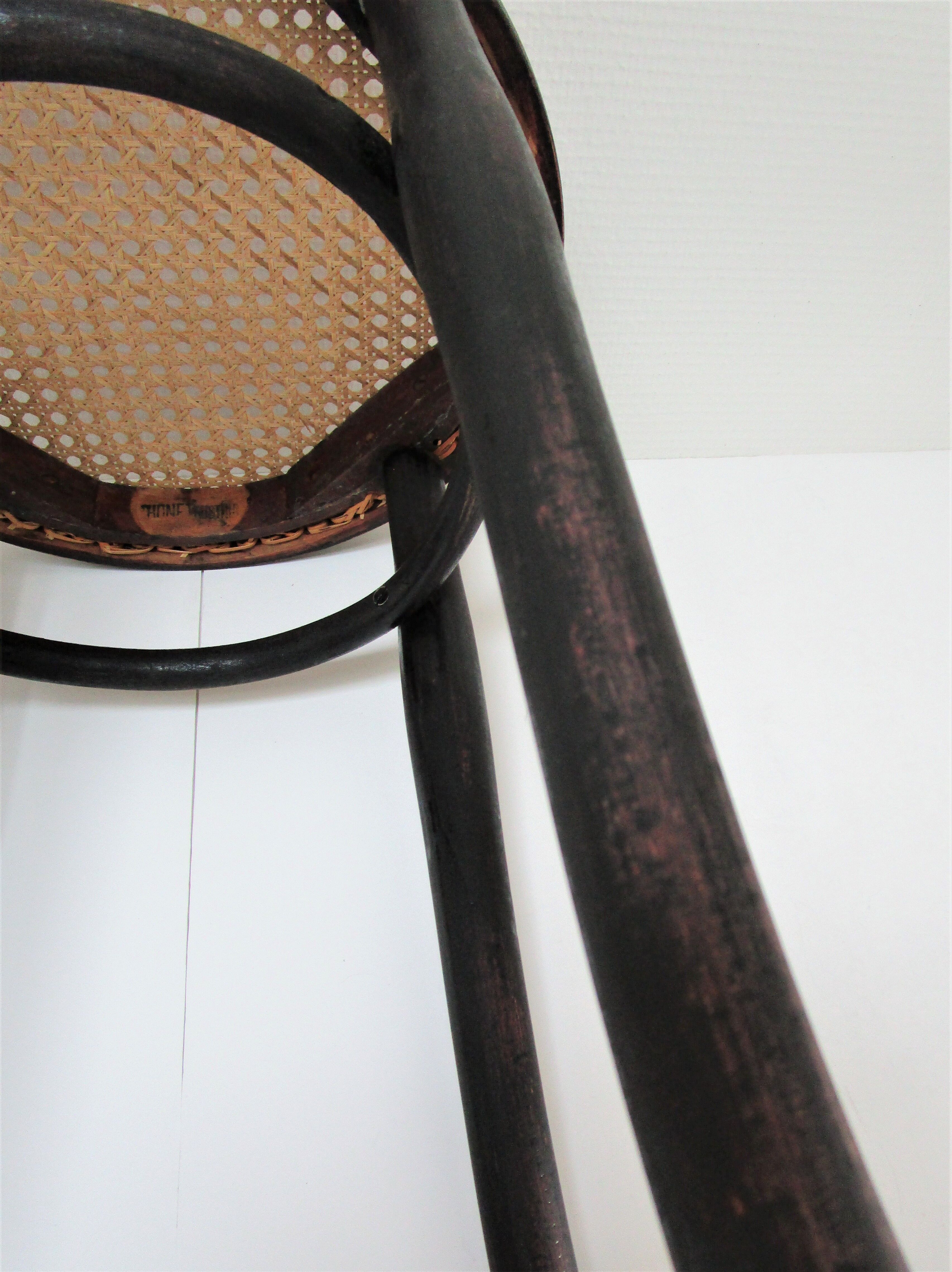 Black skated Thonet stool stamped