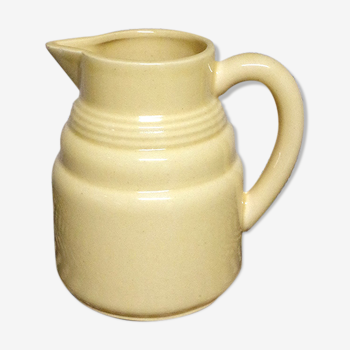 Pastel yellow ceramic pitcher