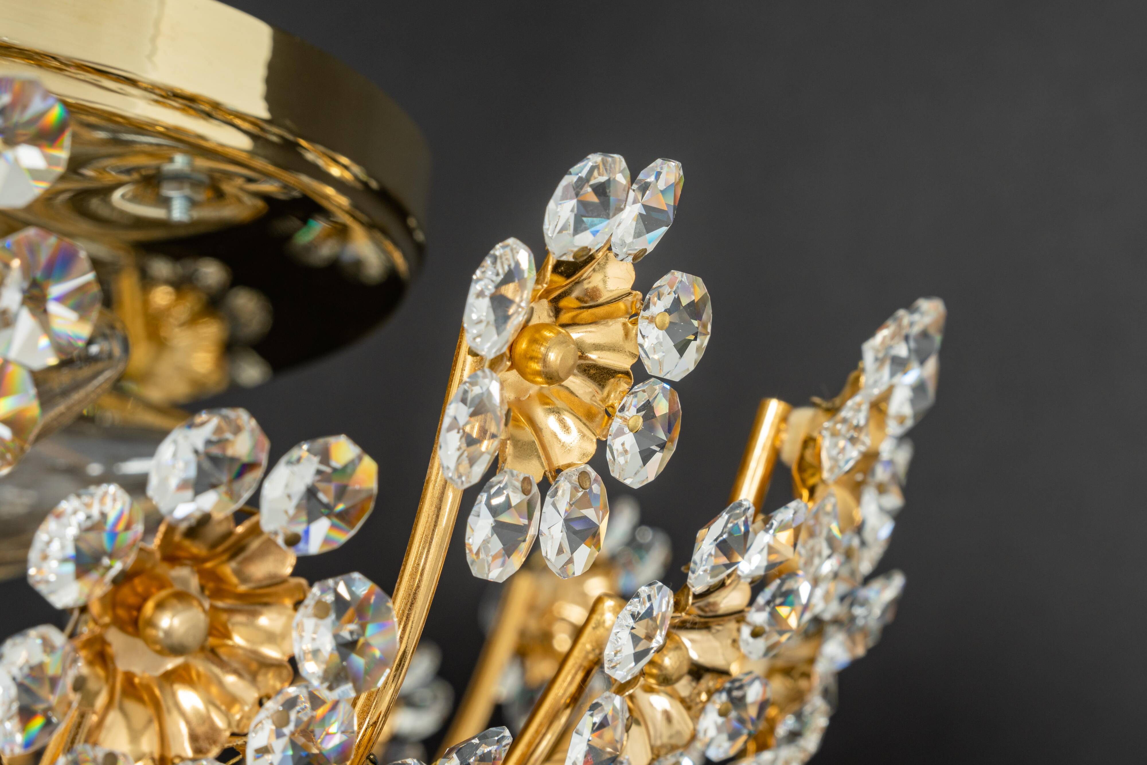 Small delicate ceiling light in gilded brass and cut glass in the shape of flowers by Palwa, Germany, 1970s.