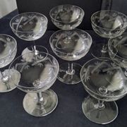 8 vintage champagne coupes with engraved decoration