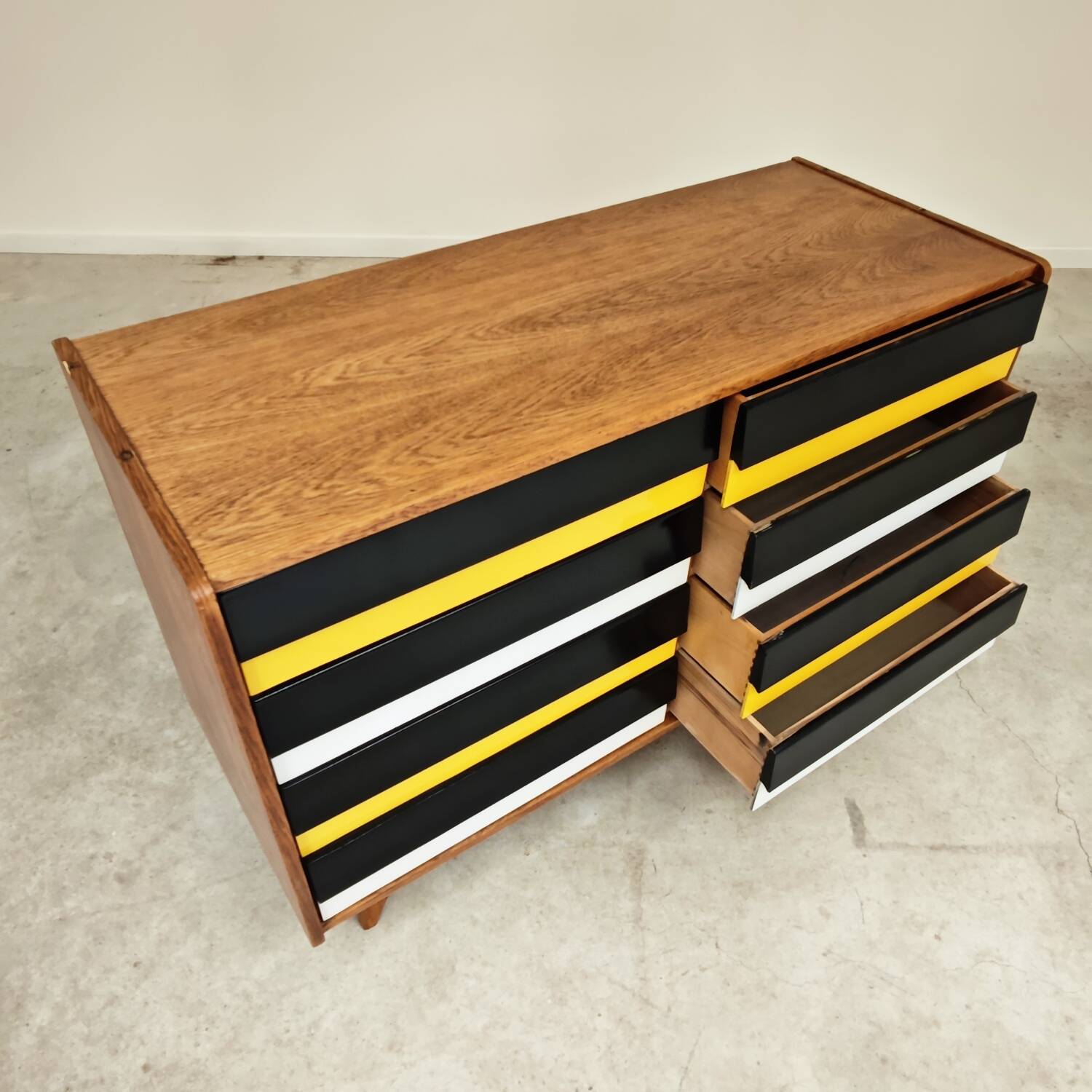 U453 yellow 8-drawer wooden sideboard by Jiri Jiroutek for Interier Praha 1960