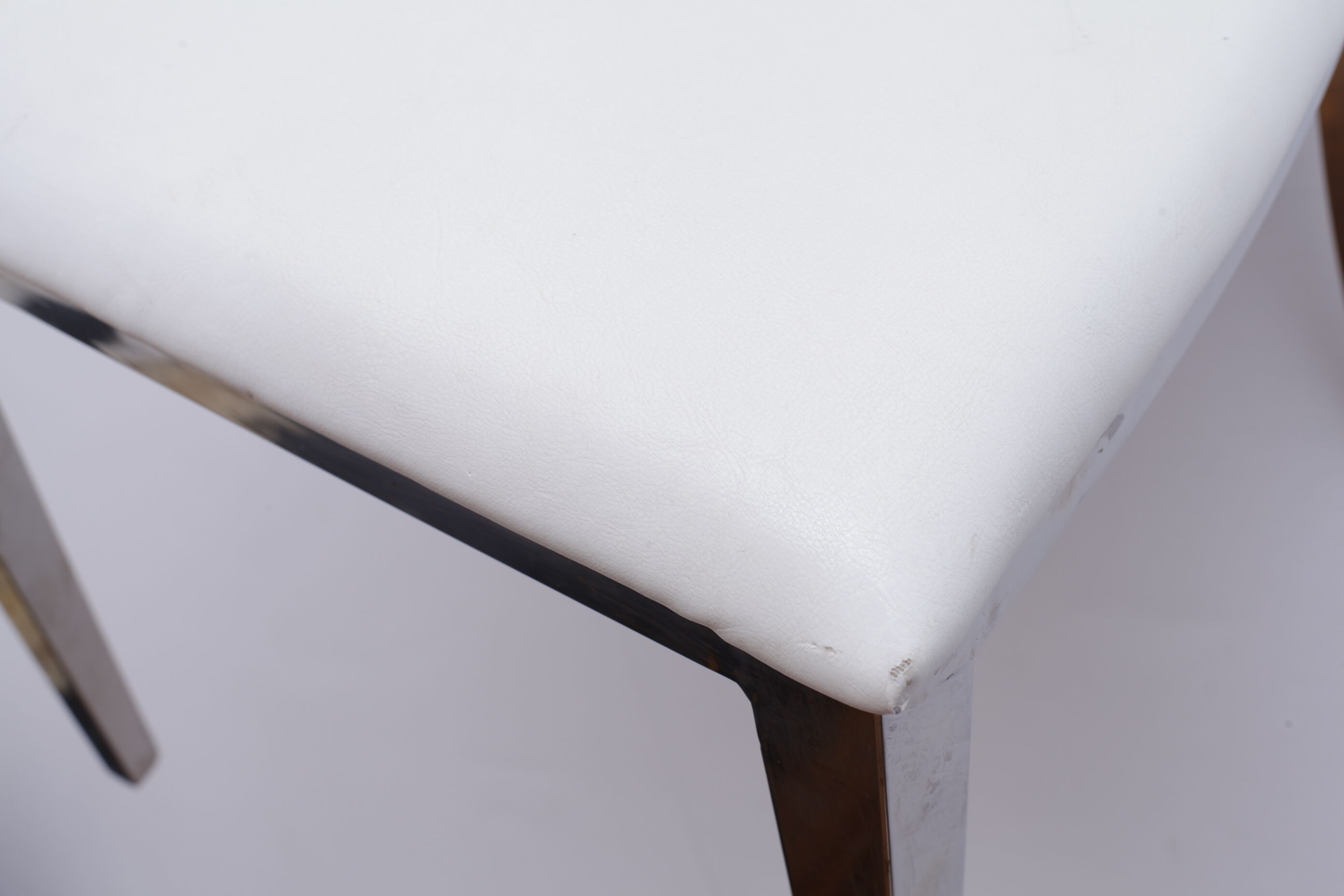 White skai chair and chrome legs