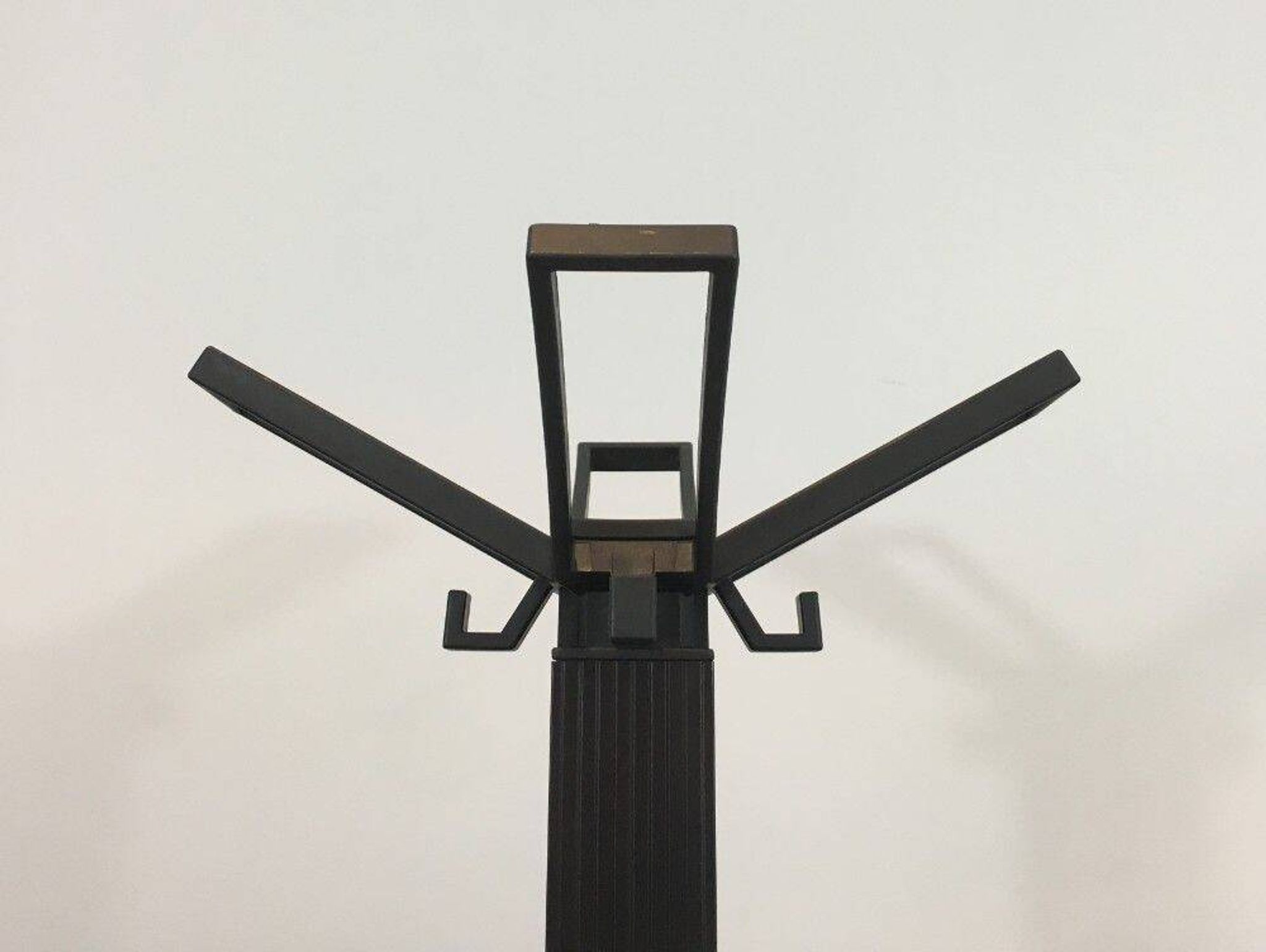 Michele De Lucchi & Tadao Takaichi for Kartell. Black plastic coat rack "Segmenti". Italy. 1989