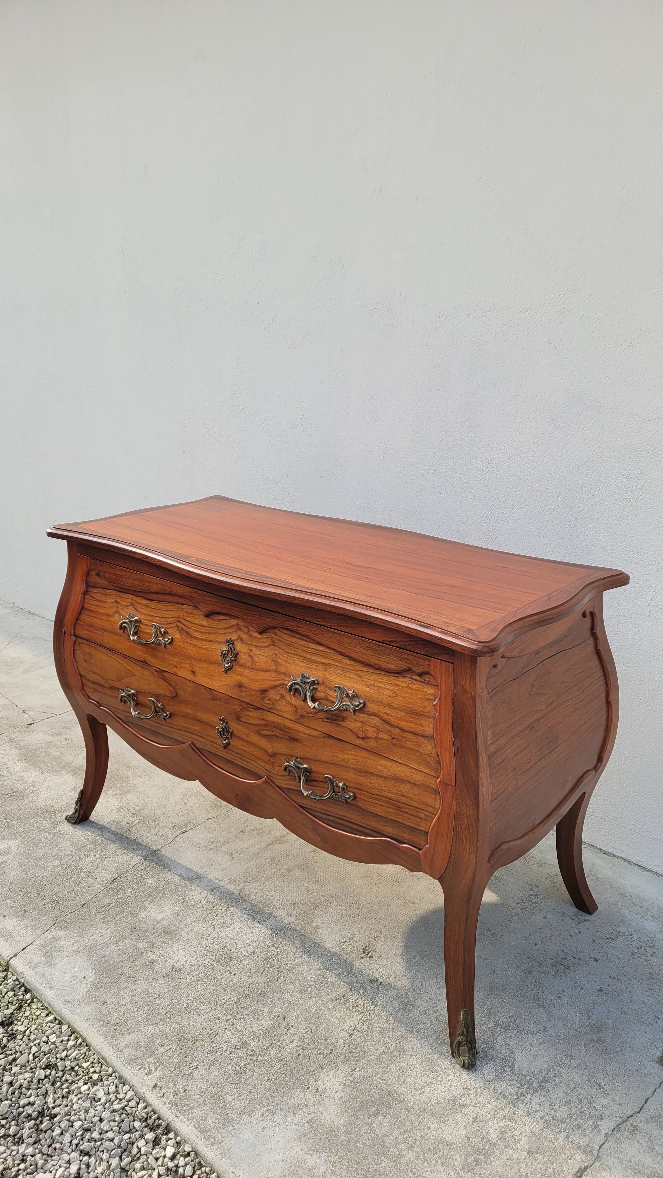 Curved Louis XV style commode in mahogany.