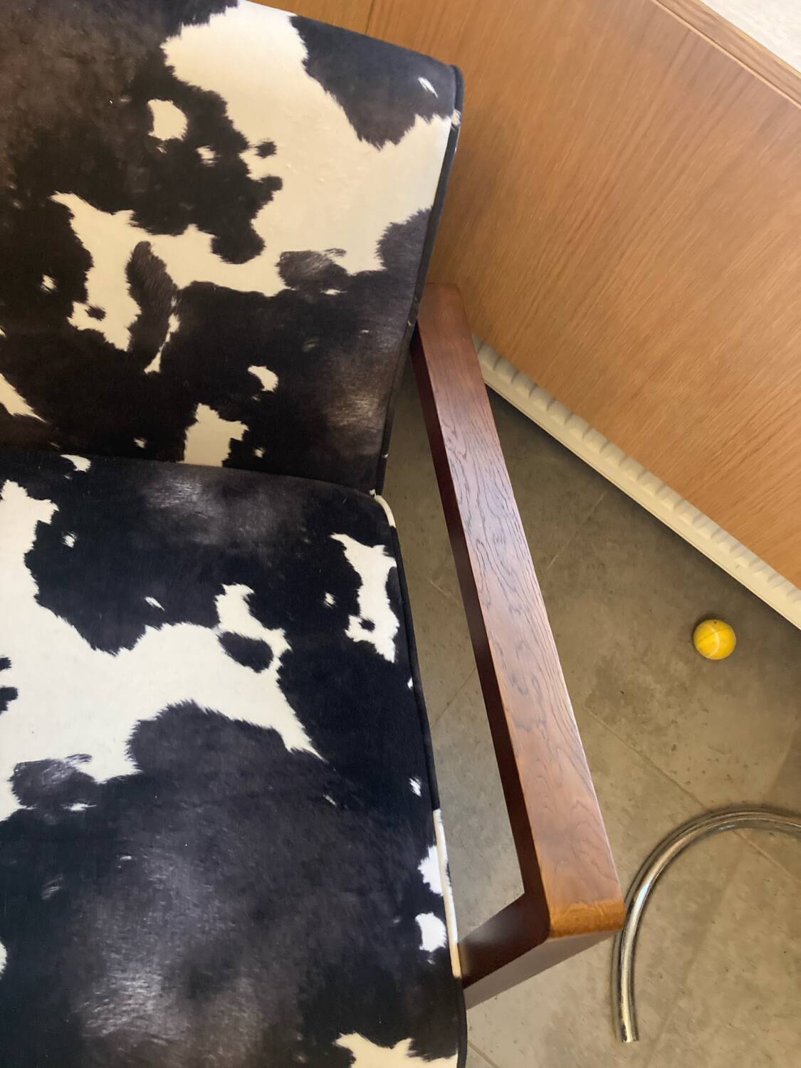 Armchair in walnut and animal print velvet