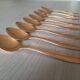 Small golden metal spoons