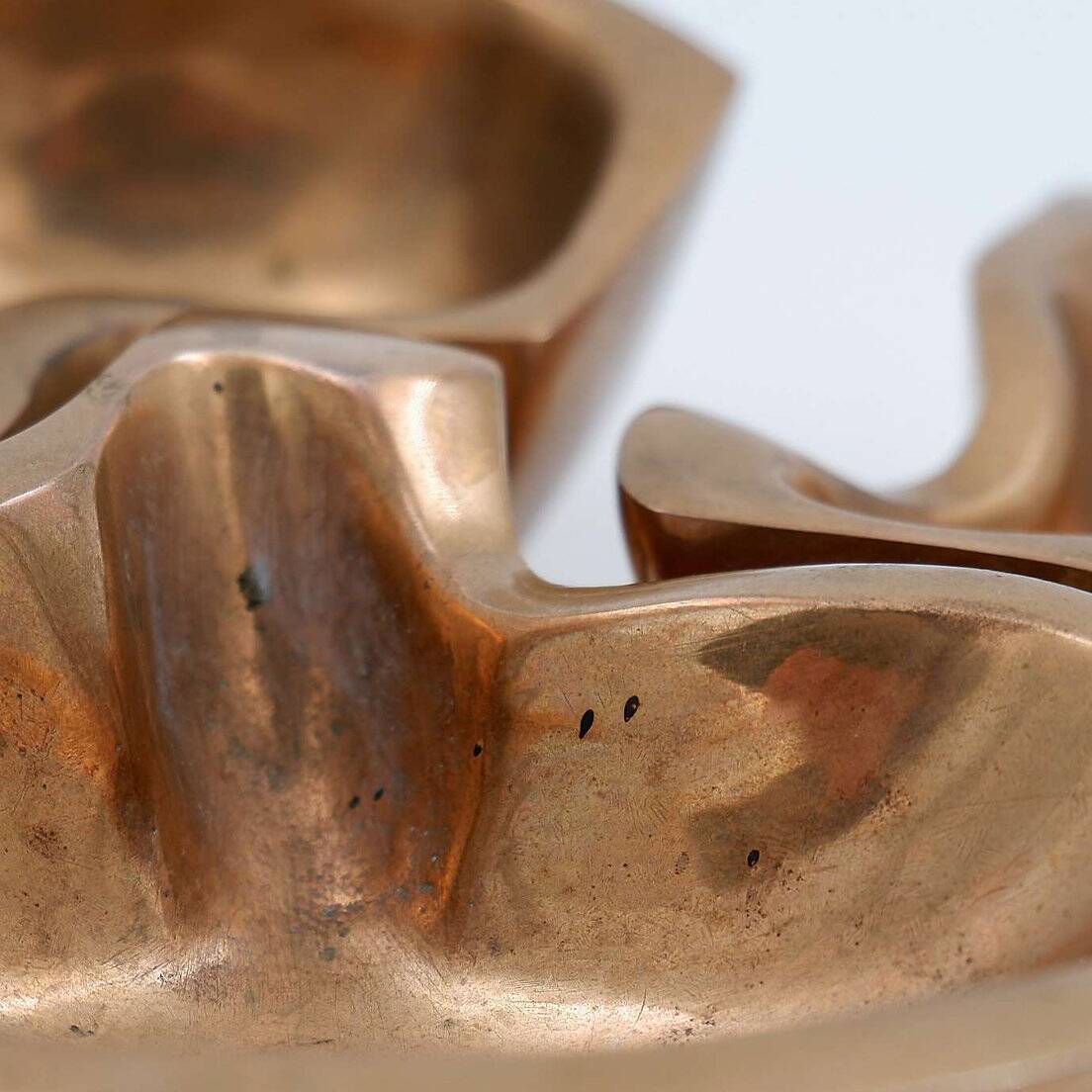 Empty Pockets in polished bronze Margrit van Nuffel 1970, set of 3