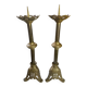 Pair of candlesticks in bronze and brass