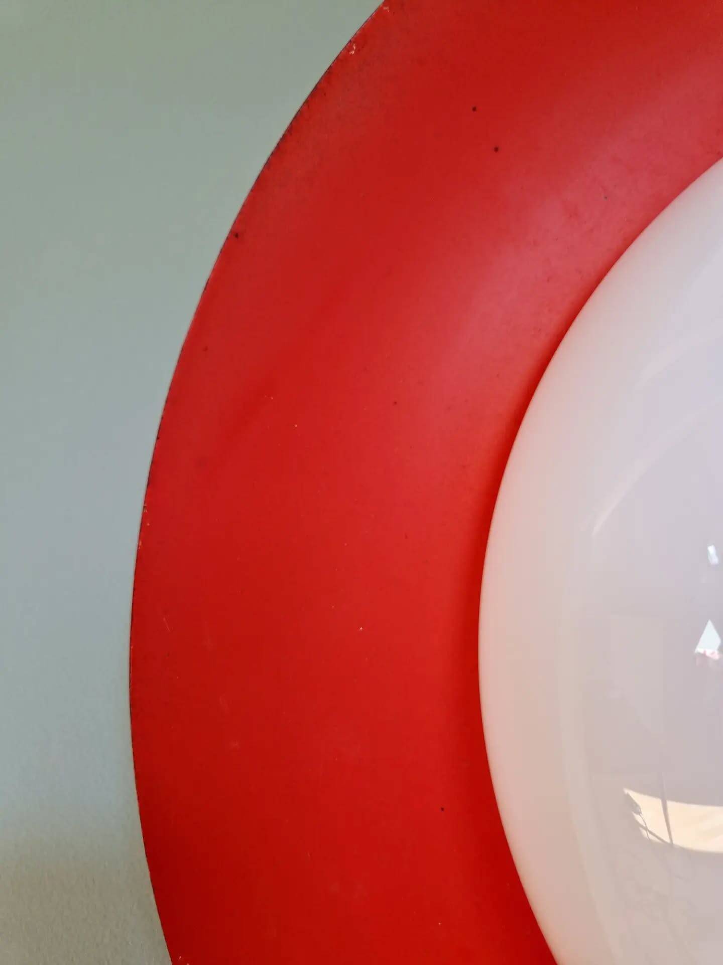 Pair of XXL Space Age wall sconces, orange lacquered metal and opaline, 1960.