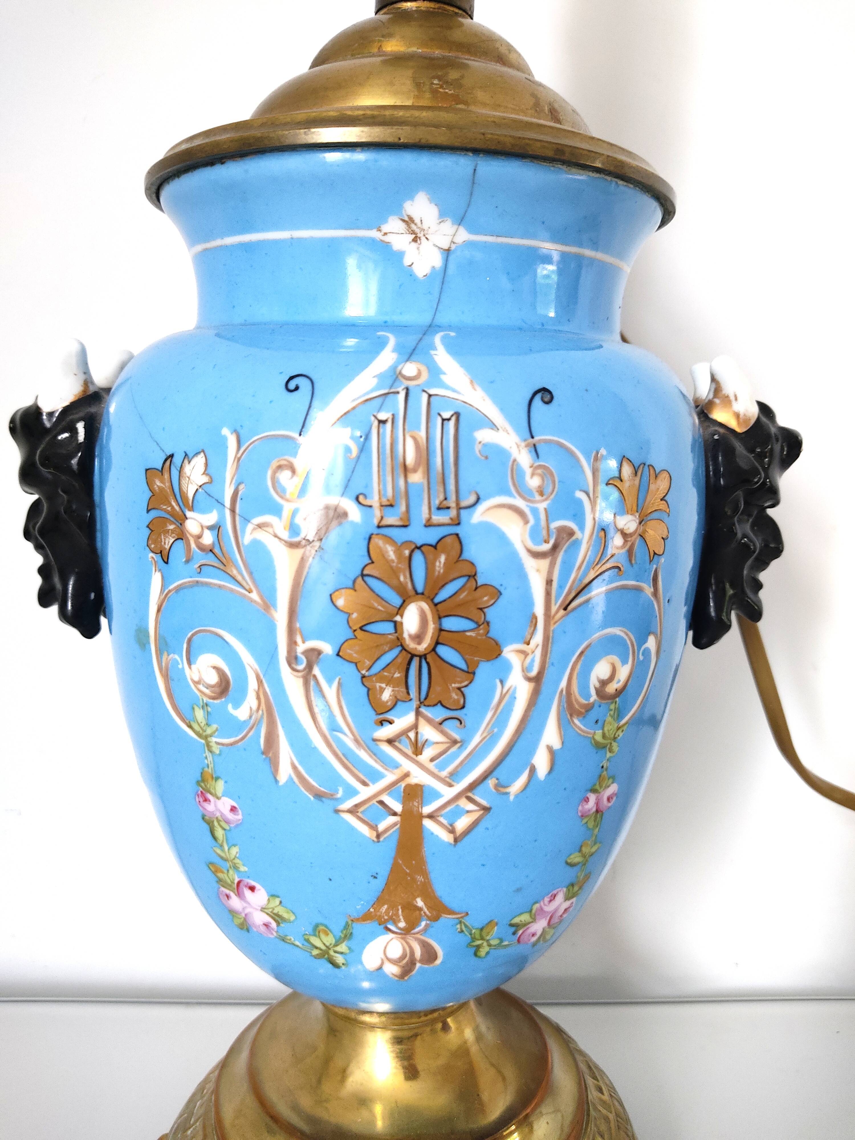 Lamp foot blue vase heads of fauna