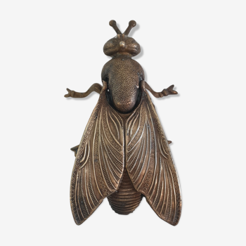 Brass fly