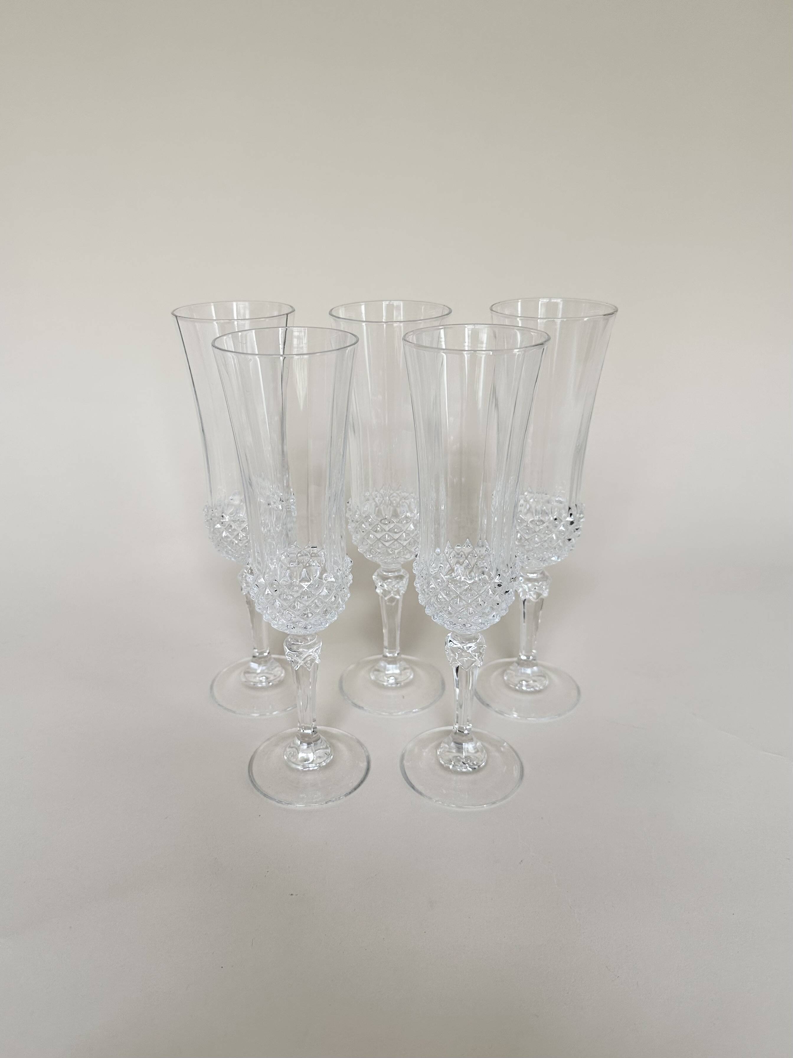 Set of 5 Cristal d'Arques champagne flutes