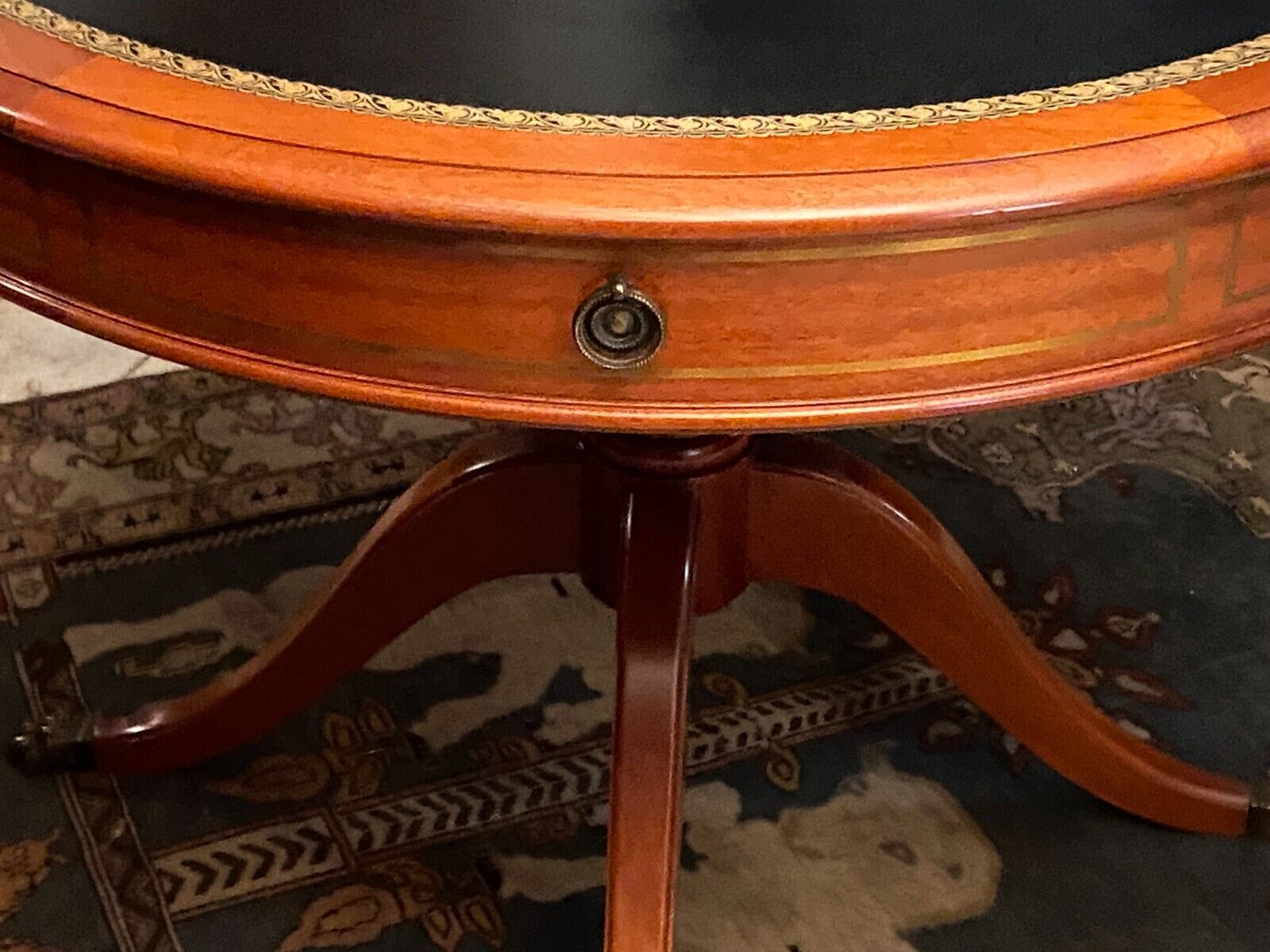 Circular table in solid mahogany and black leather claw base Restoration