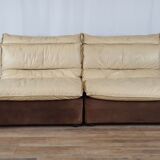 Modular sofa in leather and suede