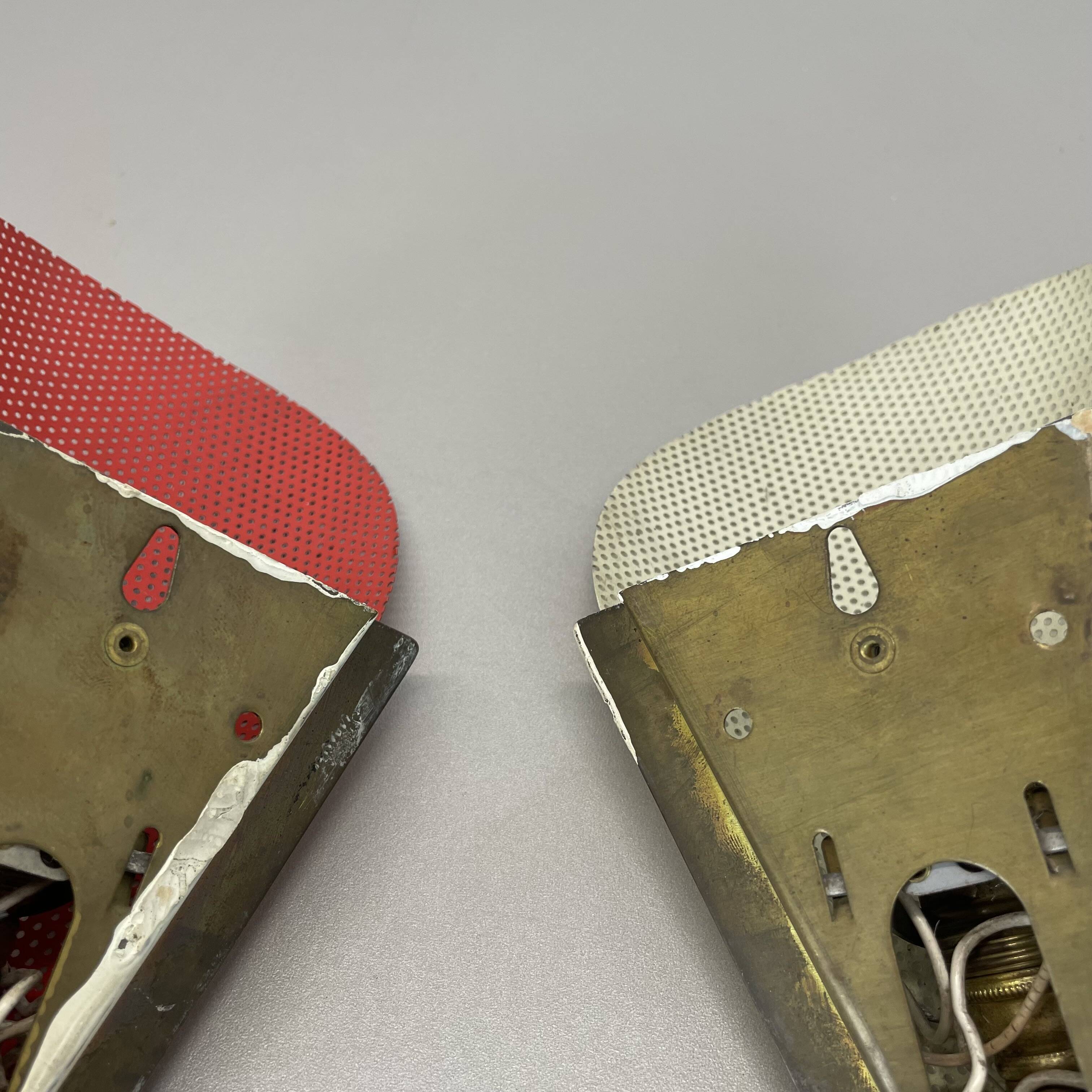 Set of two hole pattern theatre wall light sconces, france, 1950