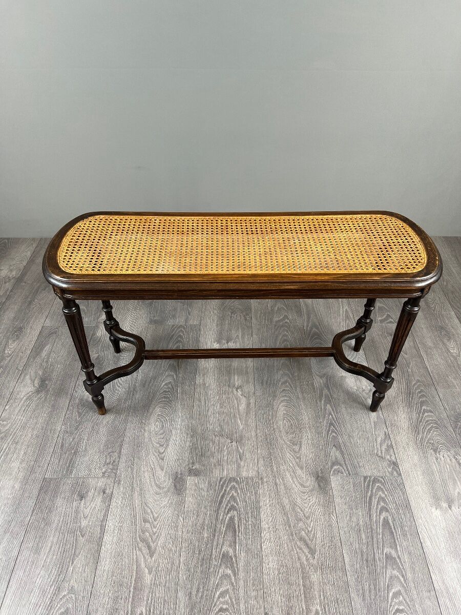 Antique wooden bench, caned seat, Louis XVI style, 20th century.