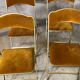 Quatre chaises pliantes velours et laiton
