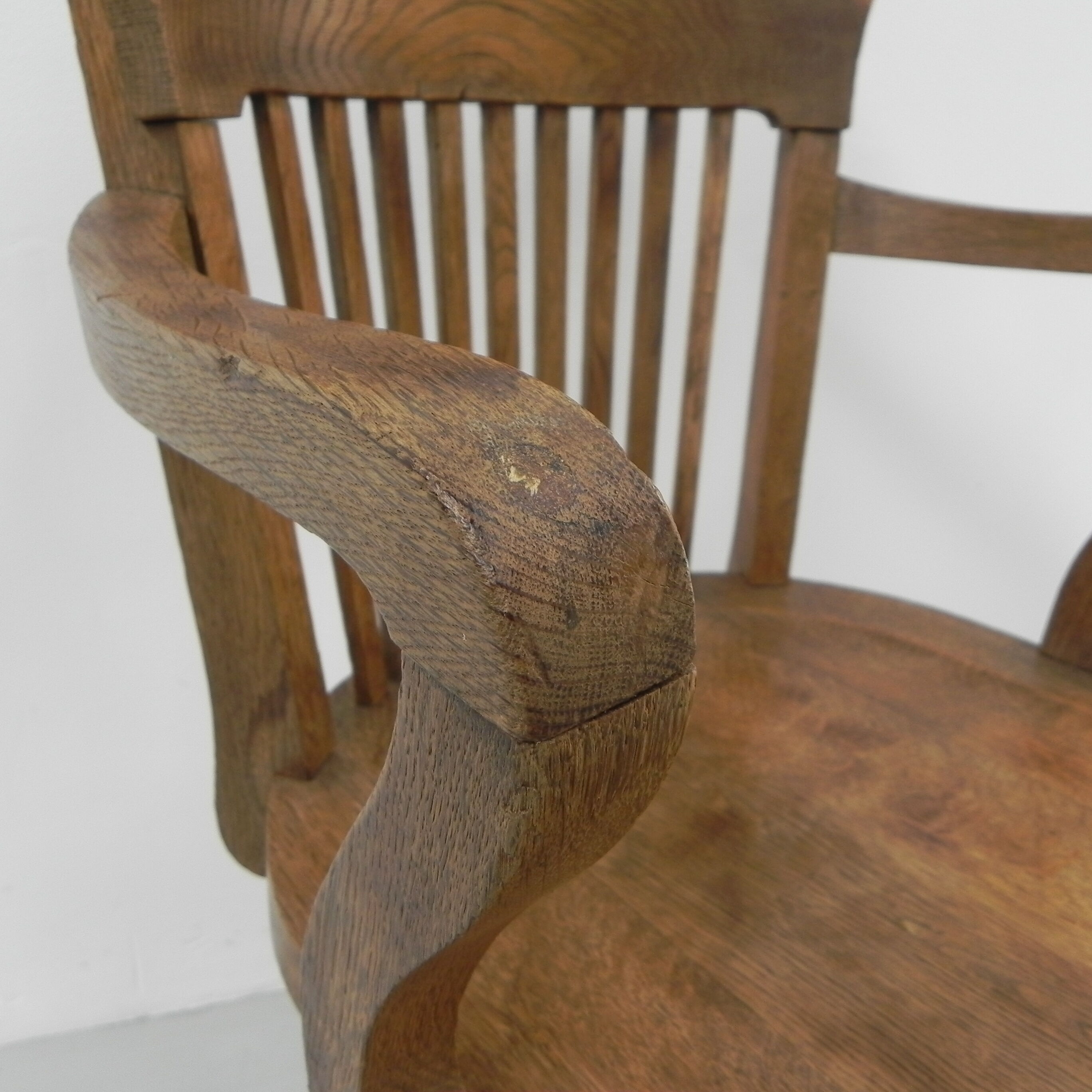 Oak office chair with spring mechanism and armrests