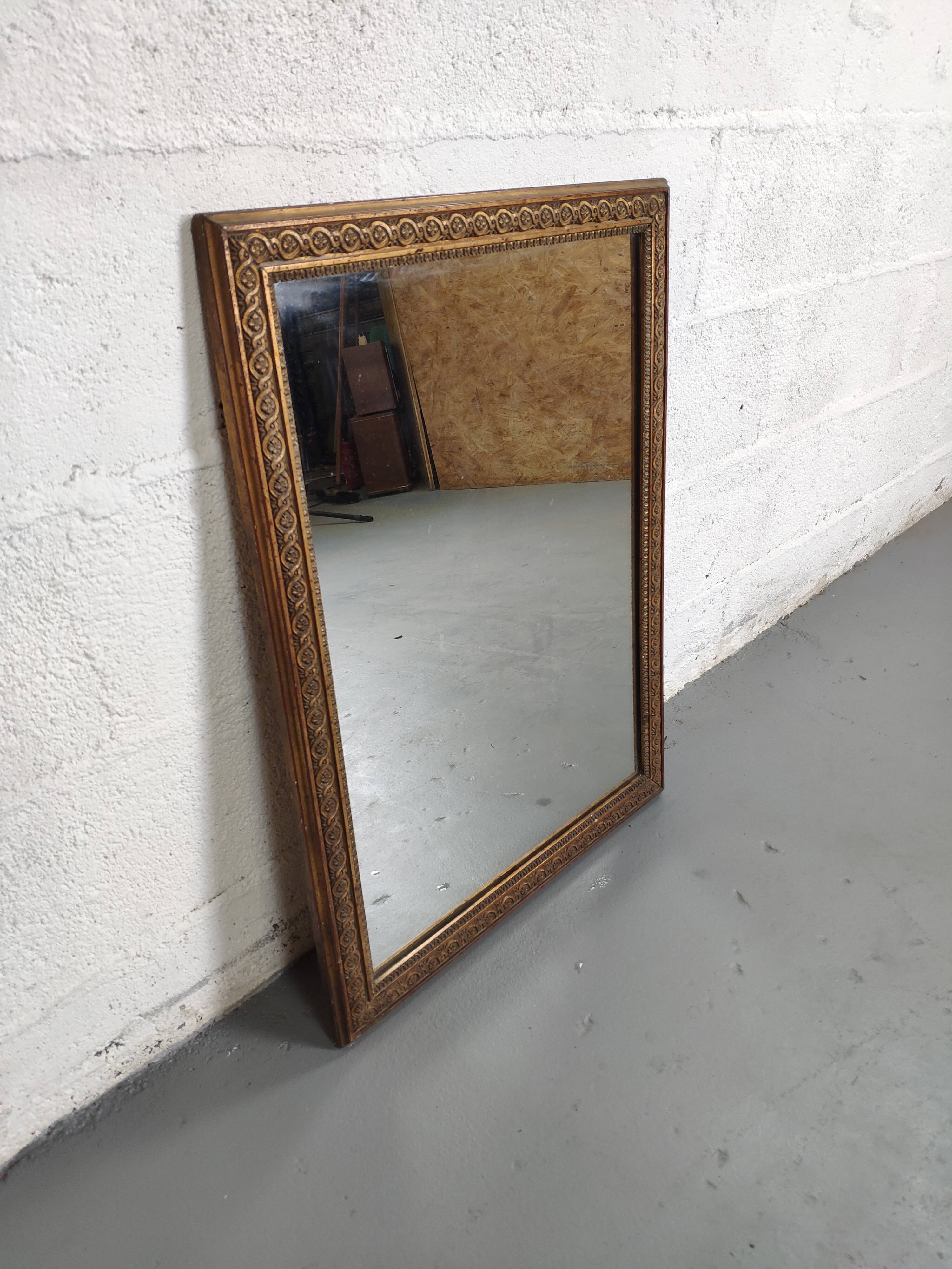 Golden contour wall mirror