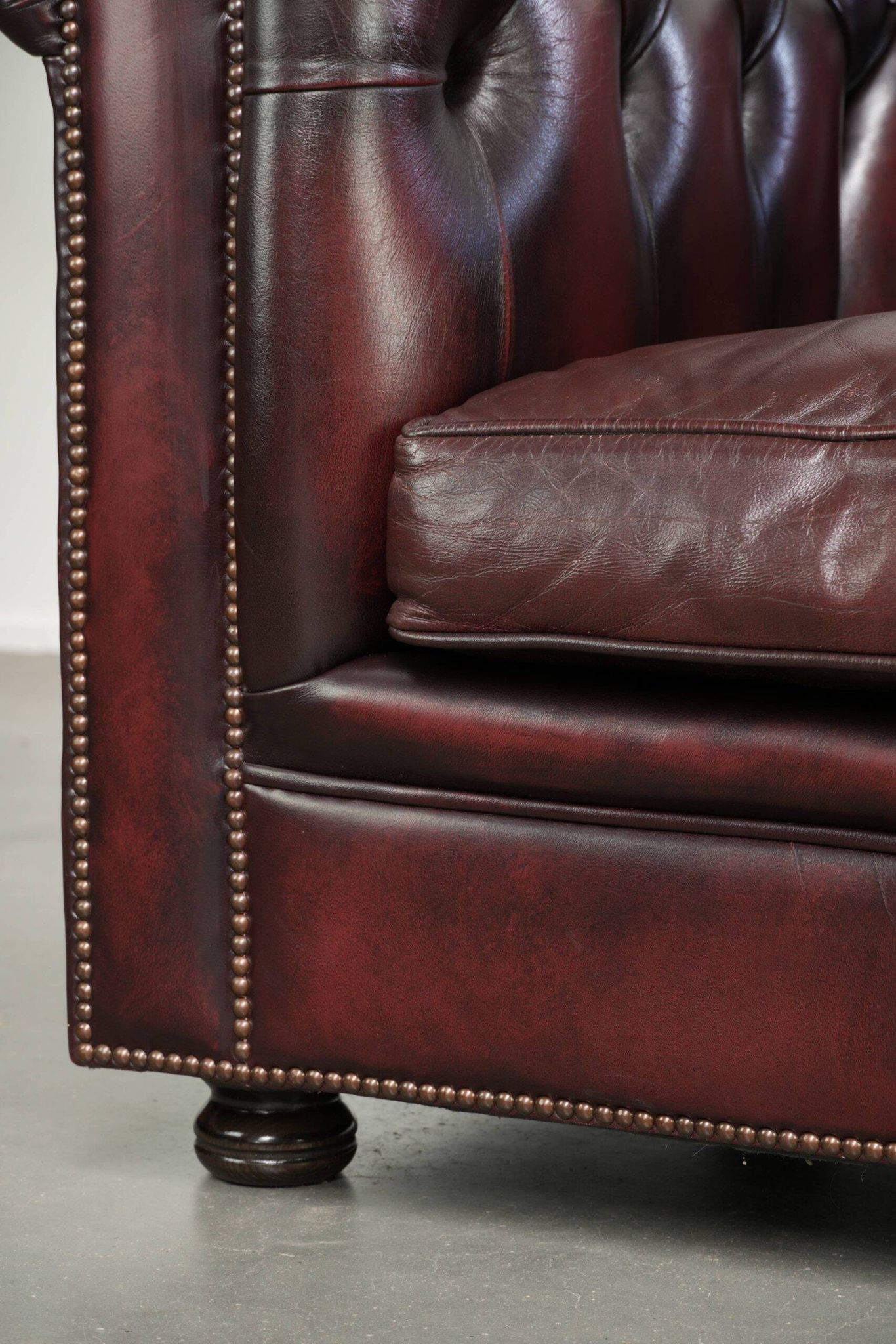 English cowhide Chesterfield club armchair in a beautiful red colour