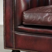 English cowhide Chesterfield club armchair in a beautiful red colour