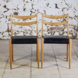 Pair of Scandinavian chairs in teak and faux leather, 1960.