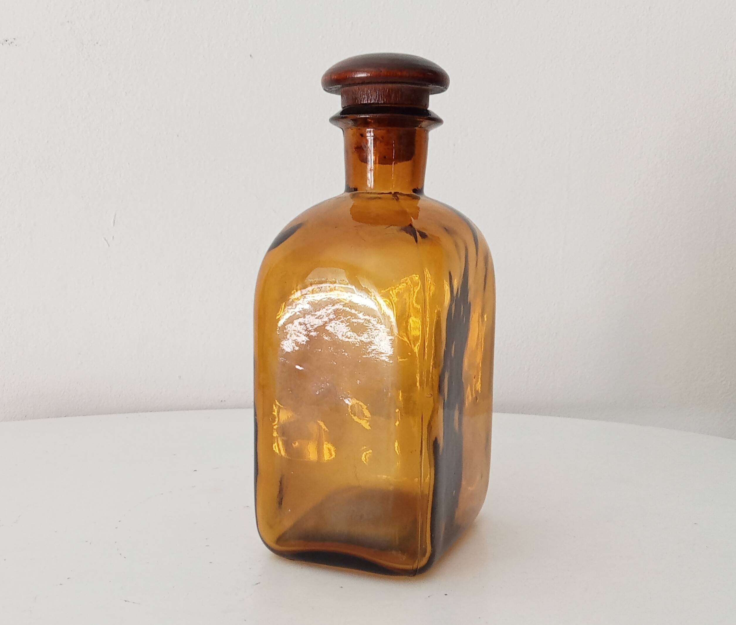 Vintage amber glass apothecary bottle