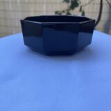 Black Arcoroc octagonal bowl with red edging.