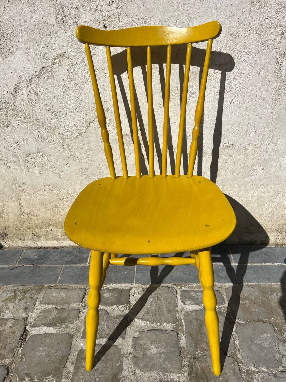 Mustard yellow Baumann chair
