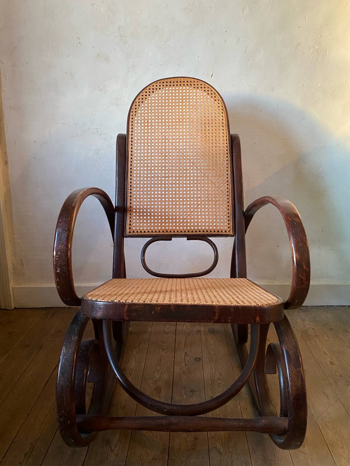 Wood and cane rocking chair