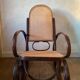 Wood and cane rocking chair
