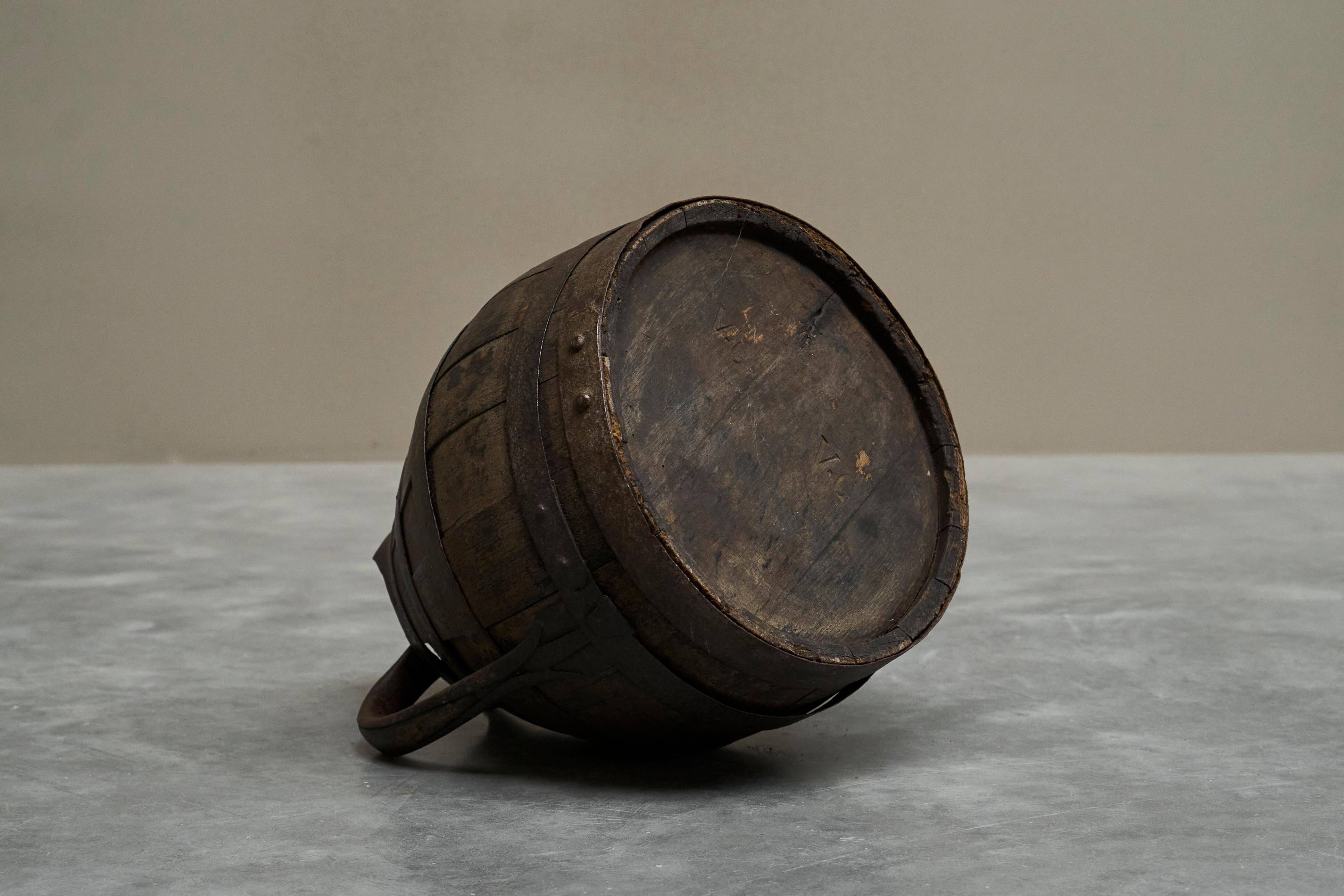 Wabi Sabi cradle in wood and wrought iron