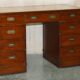 Vintage Harrods Kennedy desk in military campaign style with drawers.