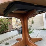 Extendable round dining table and 4 Baumann chairs.